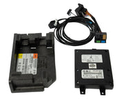 Electrical components including a black box with wiring on a white background