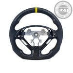 Load image into Gallery viewer, Carbon fiber steering wheel with a central hub on a light gray background

